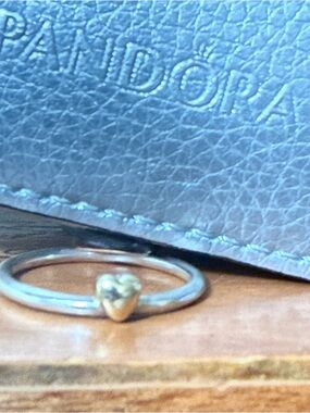 Pandora retired 14k yellow gold and sterling silver heart stack ring .